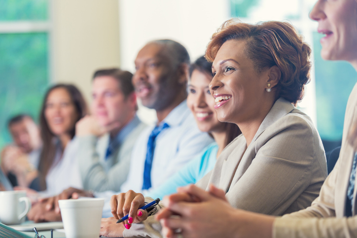 School staff meeting together