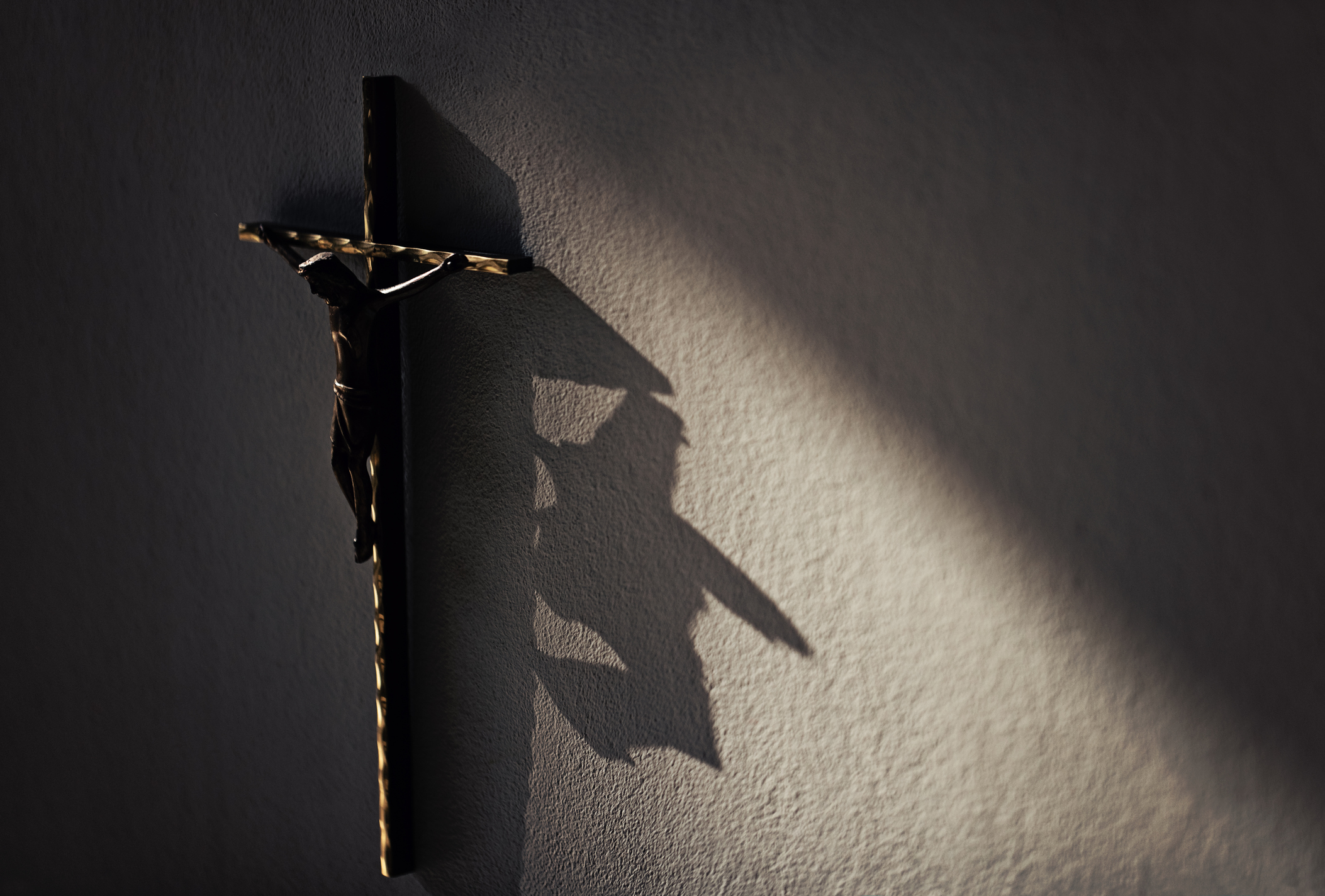 Crucifix on the wall - stock photo