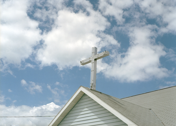 Cross on Top of a Church - stock photo