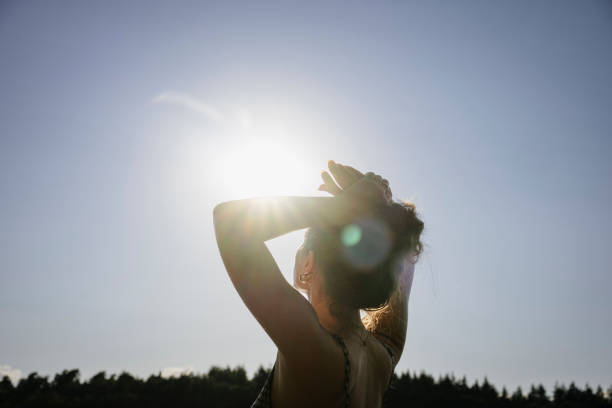 Girl watching the sun.