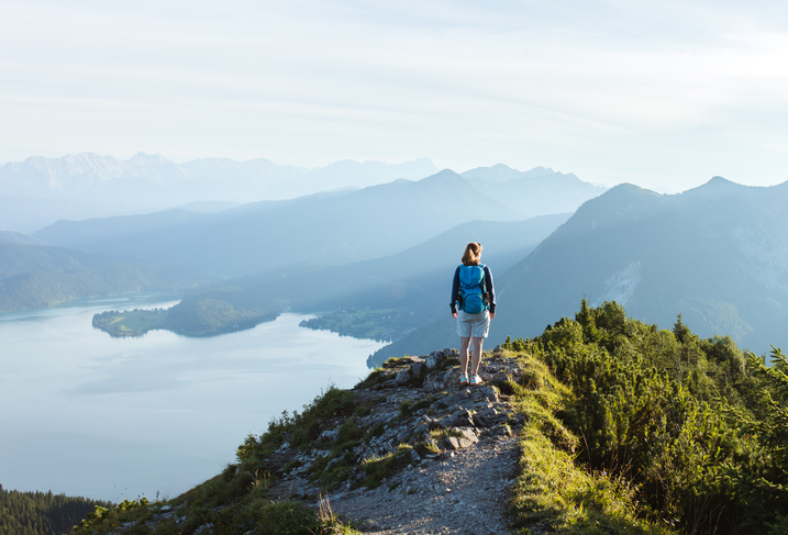 person hiking on mountain